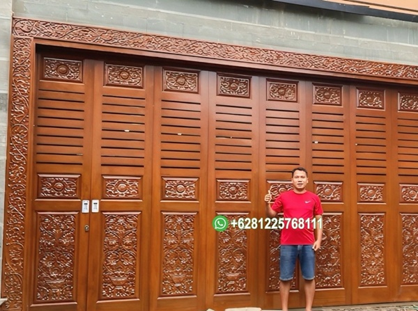 Model Pintu Garasi Kayu Jati Sliding Rel Wina Ukir Jepara